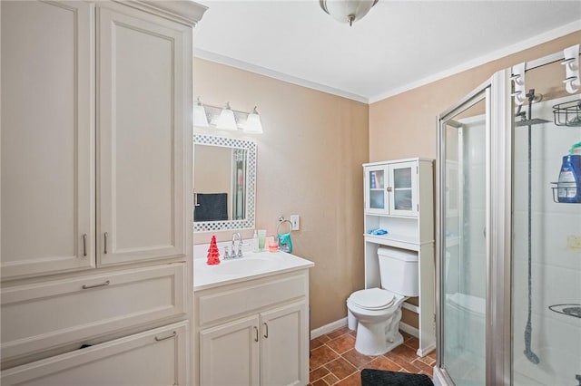 bathroom with tile patterned floors, toilet, an enclosed shower, ornamental molding, and vanity