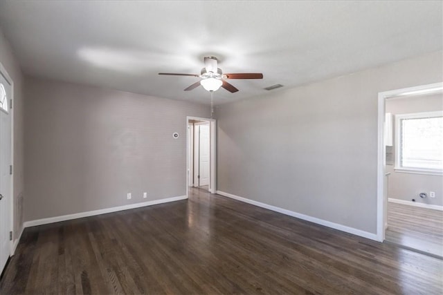 1337 Daytona Dr, Corpus Christi, TX 78415 - empty room with a ceiling fan, wood finished floors, and baseboards