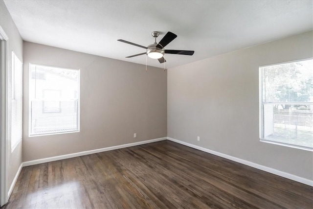 1337 Daytona Dr, Corpus Christi, TX 78415 - empty room with dark wood-style floors, baseboards, and a ceiling fan