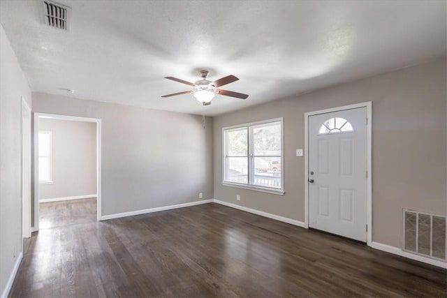 1337 Daytona Dr, Corpus Christi, TX 78415 - foyer with a ceiling fan, dark wood-style floors, and baseboards