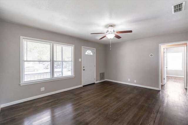 1337 Daytona Dr, Corpus Christi, TX 78415 - entrance foyer with a ceiling fan, dark wood-style floors, and baseboards