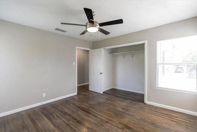 1337 Daytona Dr, Corpus Christi, TX 78415 - unfurnished bedroom featuring baseboards, a closet, wood finished floors, and a ceiling fan