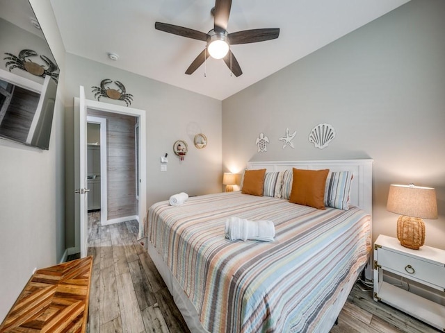 bedroom featuring ceiling fan and wood-type flooring