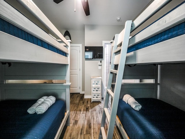 bedroom featuring ceiling fan and dark hardwood / wood-style floors