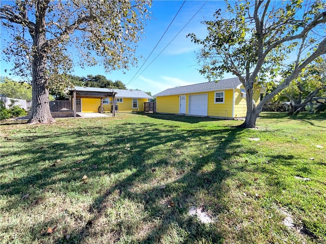 view of yard featuring a garage