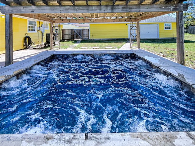 view of pool featuring an outbuilding, a yard, and a pergola