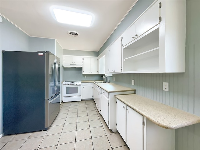 kitchen with white cabinets, white appliances, light tile patterned floors, and sink