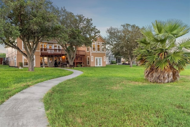 view of yard featuring a wooden deck