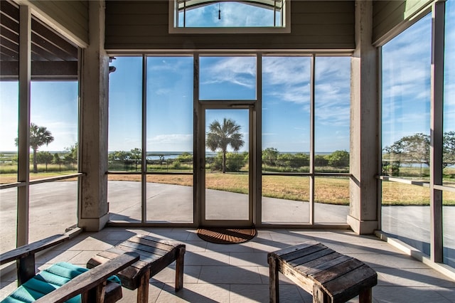 unfurnished sunroom with a healthy amount of sunlight