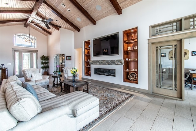 living room with light tile patterned floors, beam ceiling, high vaulted ceiling, wood ceiling, and ceiling fan with notable chandelier