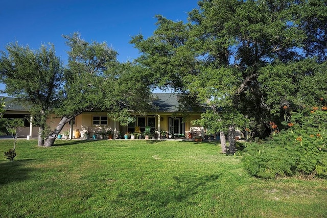 exterior space featuring a lawn