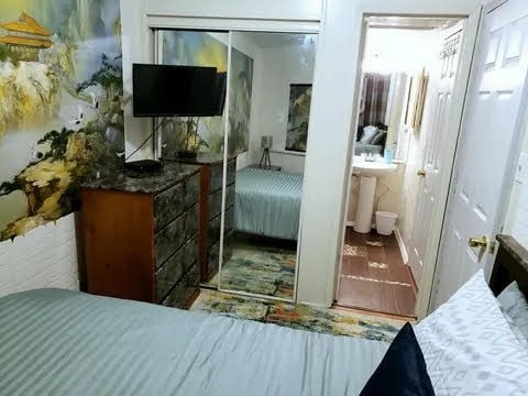 3938 Surfside Blvd Unit 1227, Corpus Christi, TX 78402 - bedroom with ensuite bathroom