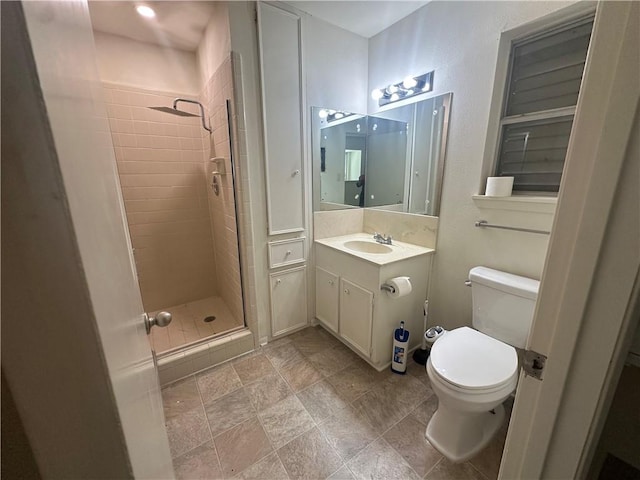 5226 Honeysuckle, Corpus Christi, TX 78415 - full bathroom featuring a stall shower, vanity, toilet, and stone finish flooring