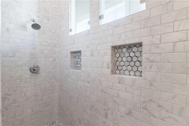 125 Fish Hook Ln, Port Aransas, TX 78373 - full bathroom with tiled shower