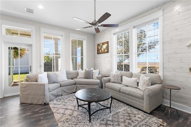 125 Fish Hook Ln, Port Aransas, TX 78373 - living room with baseboards, visible vents, dark wood-type flooring, and ceiling fan