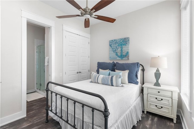 125 Fish Hook Ln, Port Aransas, TX 78373 - bedroom with ceiling fan, baseboards, dark wood-style floors, and a closet