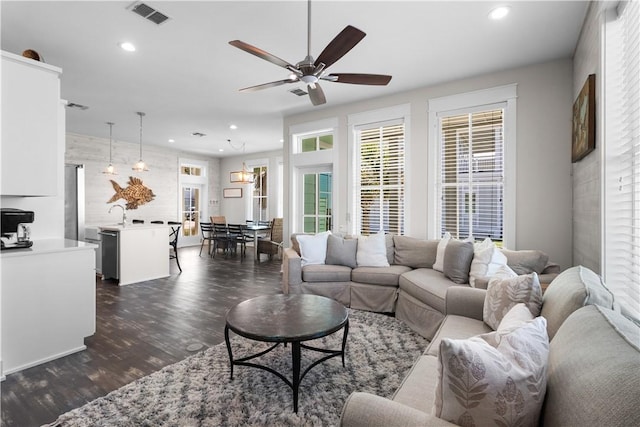 125 Fish Hook Ln, Port Aransas, TX 78373 - living area featuring a ceiling fan, dark wood-type flooring, visible vents, and recessed lighting