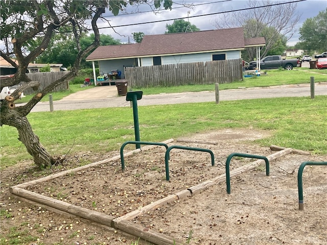 view of community featuring a yard