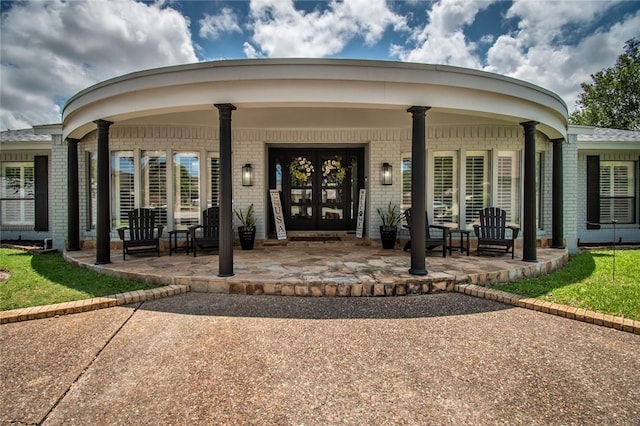 doorway to property with french doors