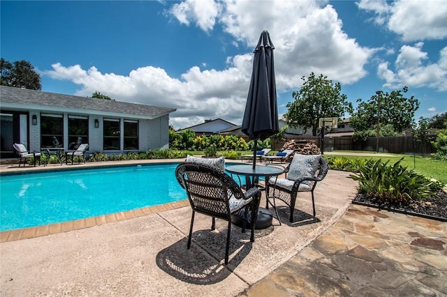 view of pool with a patio