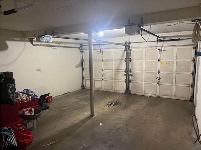 garage featuring a garage door opener