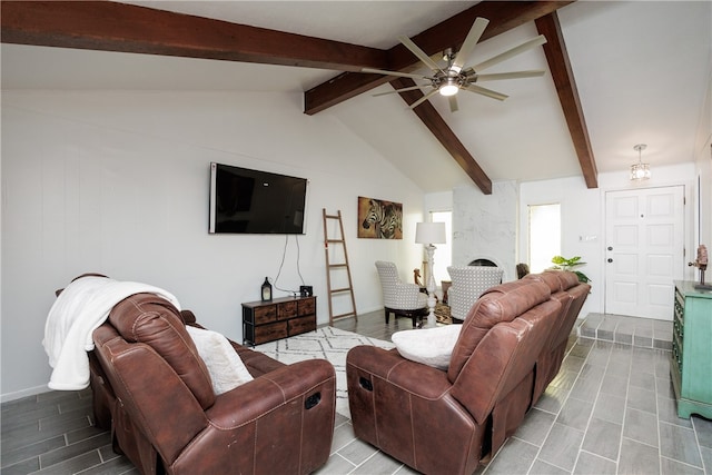 living room with vaulted ceiling with beams and ceiling fan