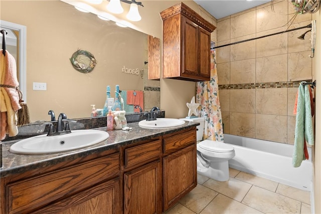 bathroom with shower / bath combination with curtain, tile patterned flooring, a sink, and toilet