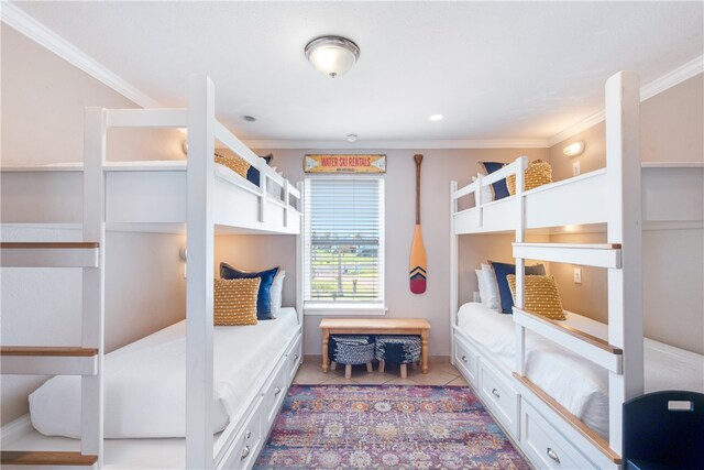 tiled bedroom featuring crown molding