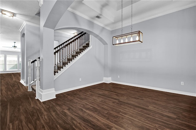 interior space featuring ceiling fan, dark hardwood / wood-style floors, and crown molding