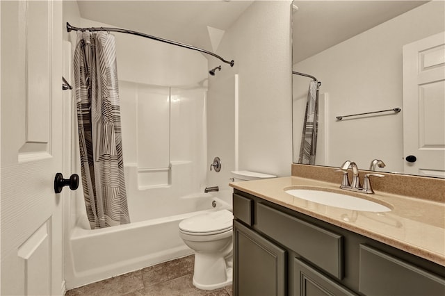 full bathroom featuring tile patterned flooring, vanity, toilet, and shower / tub combo