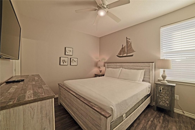 bedroom with dark wood finished floors, baseboards, and ceiling fan