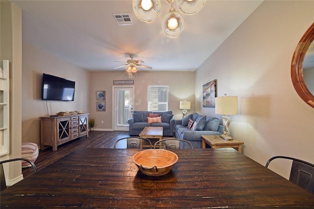 dining area featuring visible vents, ceiling fan, and wood finished floors