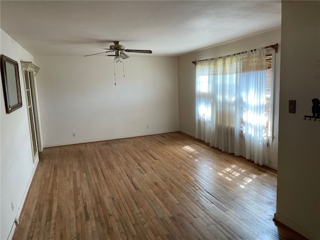 4706 Mable St, Corpus Christi, TX 78411 - empty room with ceiling fan and wood finished floors