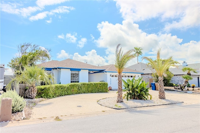 view of front of property featuring a garage