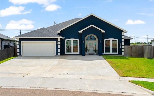 4229 Midlands St, Corpus Christi, TX 78414 - ranch-style house featuring an attached garage, stucco siding, driveway, and roof with shingles