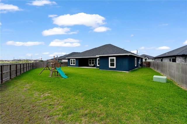 4229 Midlands St, Corpus Christi, TX 78414 - rear view of house with a playground