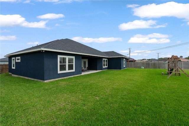 4229 Midlands St, Corpus Christi, TX 78414 - rear view of property featuring a playground and a patio area