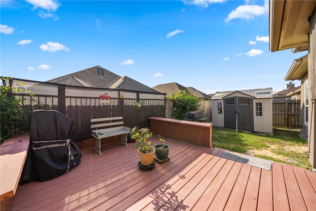 deck featuring a shed