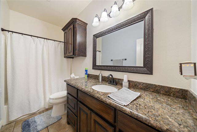 full bathroom with tile patterned floors, vanity, toilet, and shower / bath combination with curtain