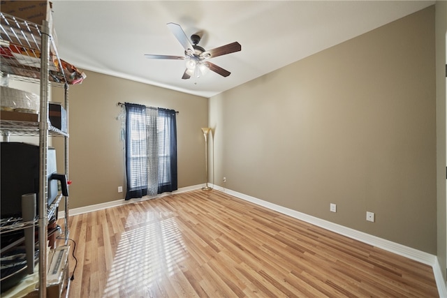 interior space featuring ceiling fan and wood-type flooring