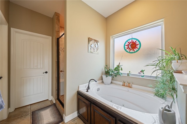 bathroom with shower with separate bathtub and tile patterned flooring