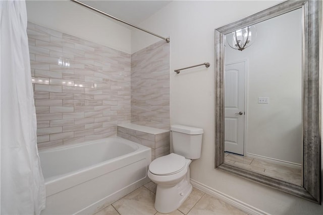 bathroom with tile patterned flooring, toilet, shower / tub combo, and a chandelier