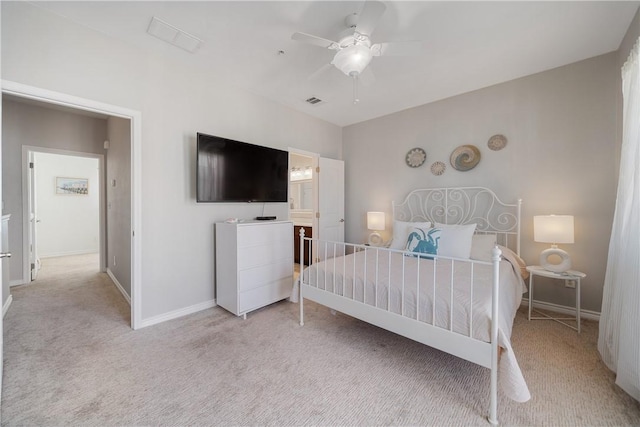 bedroom featuring light carpet and ceiling fan