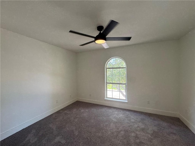 8038 Etienne Dr, Corpus Christi, TX 78414 - spare room with a ceiling fan, dark colored carpet, and a textured ceiling