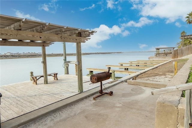 view of dock with a water view and a pergola