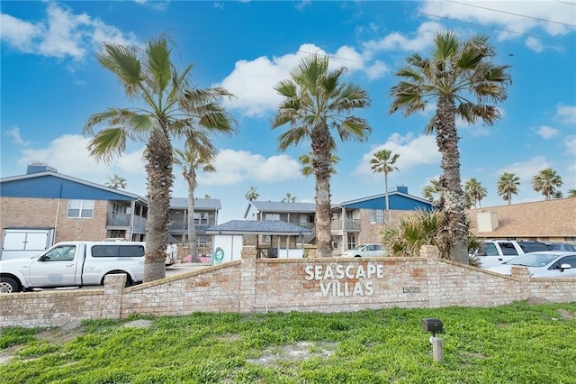 community sign with a residential view