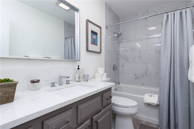 full bathroom with shower / bath combo, decorative backsplash, vanity, and toilet