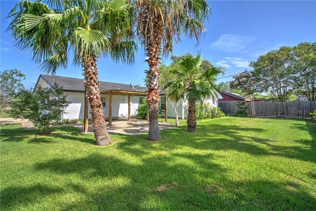 5372 County Road 73a, Robstown, TX 78380 - view of yard featuring a patio and a garage
