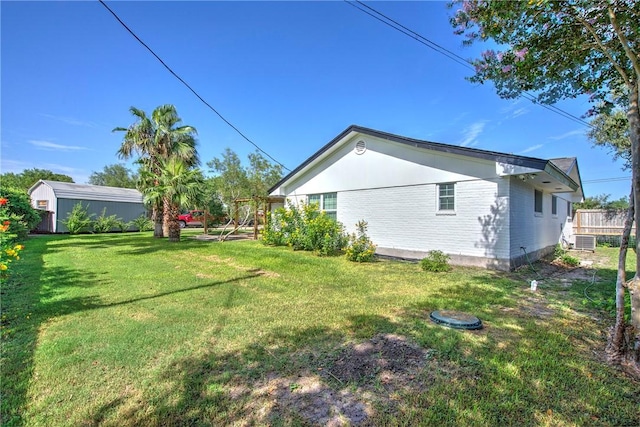 5372 County Road 73a, Robstown, TX 78380 - view of grassy yard featuring an outdoor structure