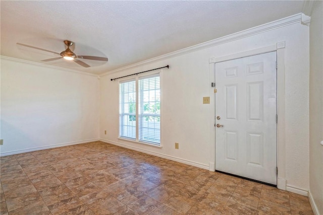 5372 County Road 73a, Robstown, TX 78380 - foyer with crown molding, ceiling fan, and tile patterned floors
